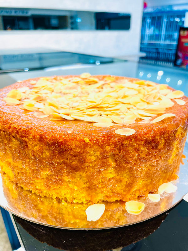 A moist orange and almond cake made with whole oranges and finished with sliced almonds